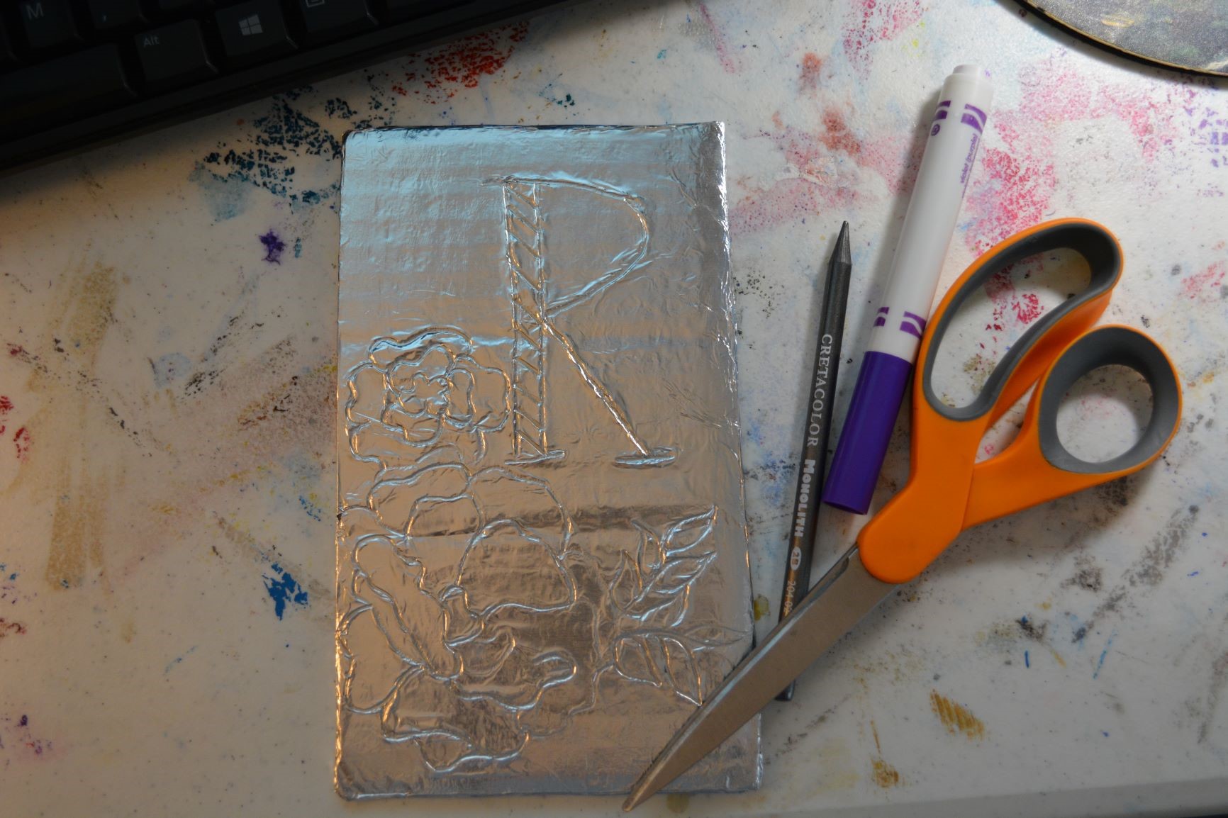 How to Adhere Foil to Cardboard