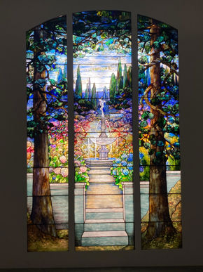 Three-part Garden Landscape window for Linden Hall (center panel), designed by Agnes F. Northrop, Tiffany Studios, New York, 1912, leaded favrile glass