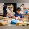 Glassell Junior School young architects class - students with artwork