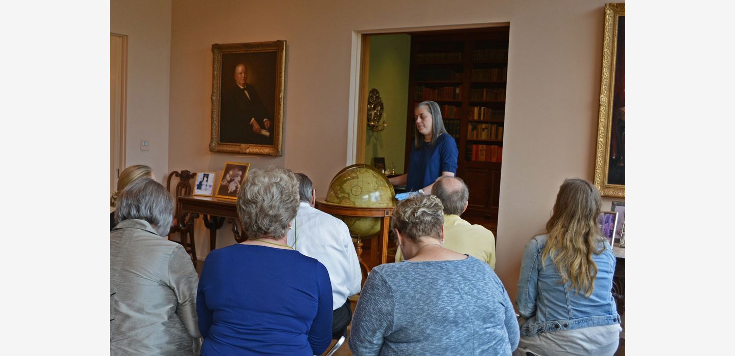 Rienzi gallery talk in library/living room - Christine Gervais with Cary brothers globe