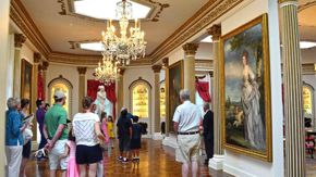 Visitors visiting the galleries of the Rienzi house museum.